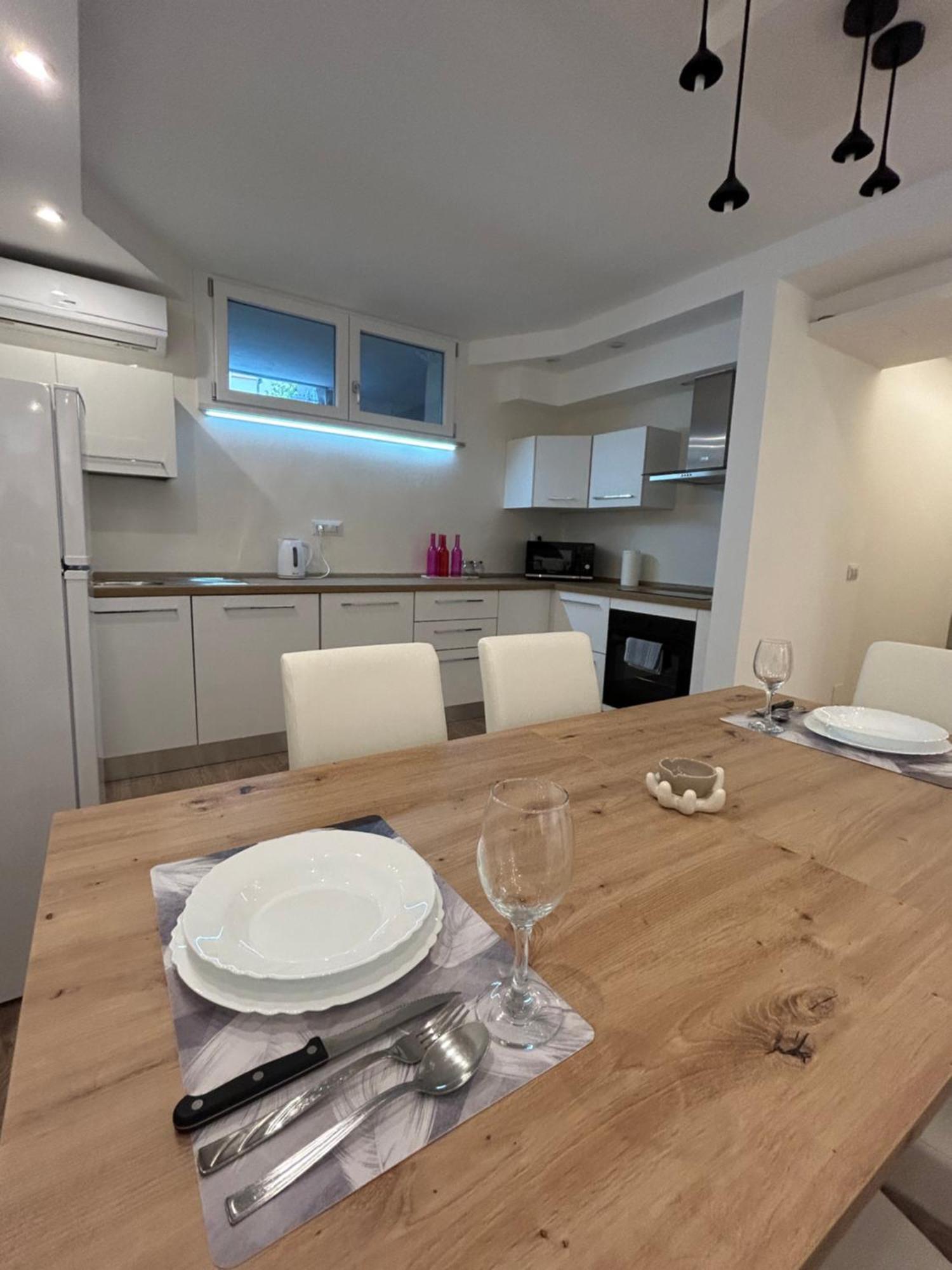 Nura'S - Casa Azzurra Seaside Apartment Alghero Bagian luar foto
